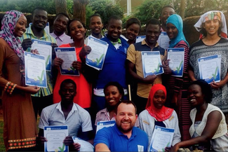 aid kampala university uganda training phil certificates harris bastable holding students right their